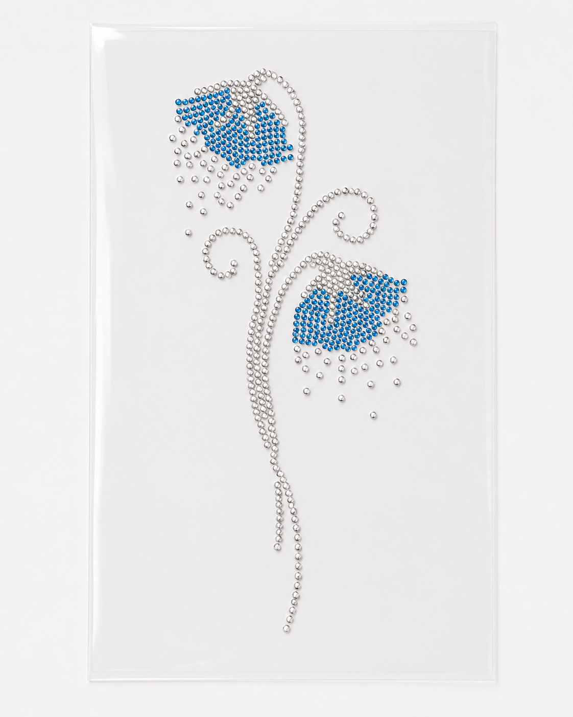 Crystal blue flower rhinestone heat transfer sticker with clear crystal swirl accents for T-shirts, dresses, bags, and apparel decoration.