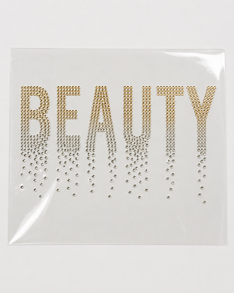 Beauty gold and clear crystal rhinestone heat transfer sticker for T-shirts, hoodies, salon wear, and apparel decoration.
